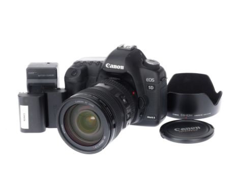 A Canon 5D MkII Digital Camera, black, serial number 4061813420, body VG, working, LCD is clear, shutter works, AF works, wit