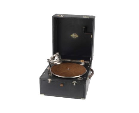 A Gilbert Gramophone, black, condition F-G, tsome lifting of the leatherette covering, silver acoustic horn is in good condit