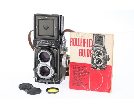 A Rolleiflex 3.5T Medium Format TLR Camera, grey, serial number T2122558, body mostly VG, except for use of glue on the focus