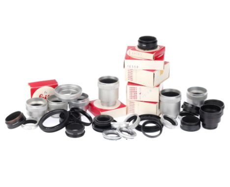 A Selection of Leitz Lens Accessories, to include adapters and lens hoods, some in maker's boxes.