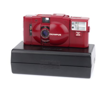 An Olympus XA2 Compact Viewfinder Camera, red, body G, shutter working, battery tested, appears to meter light, with A11 flas