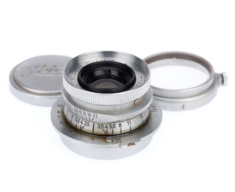 A Leitz Wetzlar Summaron f/3.5 3.5cm Lens, chrome, serial number 750535, barrel G, optics G, light peripheral haze, with caps