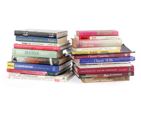 A Selection of Modern Camera Books, to include compendia for many of the major makers including Canon, Nikon, Leica, Hasselbl