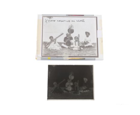 Indian Musicians Whole plate glass plate negative showing a group of Indian musicians with sitars, dilruba and drum. Some lig