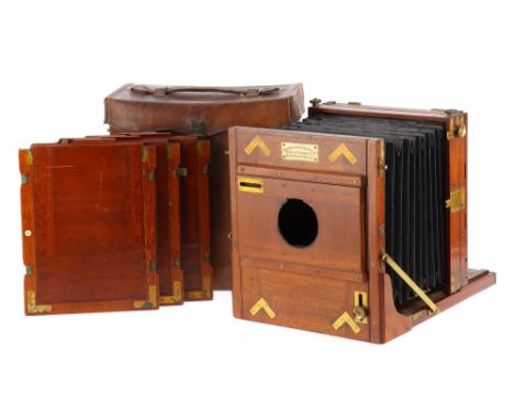 A London Stereoscopic Co. Full Plate Mahogany &amp; Brass Folding Bed Camera, mahogany &amp; brass, body G, some areas of rep