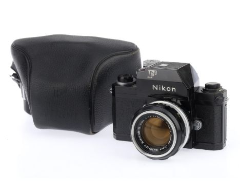 A Nikon F Photomic 35mm SLR Camera, black, serial number 6733230, body G, light marks to bottom plate, shutter working, viewf