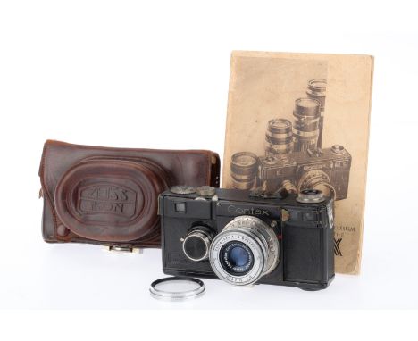 A Zeiss Ikon Contax If Rangefinder Camera, black, serial number Z69490, body F, some paint wear, shutter not opening properly