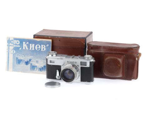 A Kiev II 35mm Rangefinder Camera, silver, serial number 550769, body G, shutter works but curtains are slow, rangefinder par