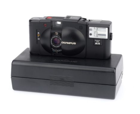 An Olympus XA2 Compact Viewfinder Camera, black, body VG, shutter working, battery tested, appears to meter light, with worki