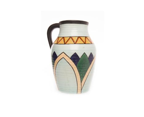 WILKINSON 'EGYPTIAN' LOTUS JUG, possibly by John Butler, the ribbed body hand painted in colours with a geometric band above 
