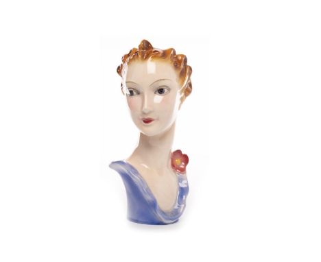 GOEBEL ART DECO BUST OF A LADY, modelled with a flower on her blue collar, impressed mark to base, 21cm high