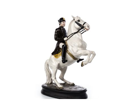 BESWICK FIGURE GROUP OF LIPIZZAN HORSE AND RIDER, modelled rearing, second version on oval ceramic plinth, printed mark to ba