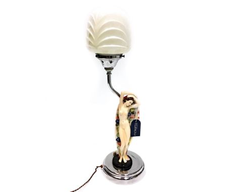 ART DECO GOEBEL FIGURAL TABLE LAMP, the nude figure of a lady modelled stretching, on a chrome base, 58cm high