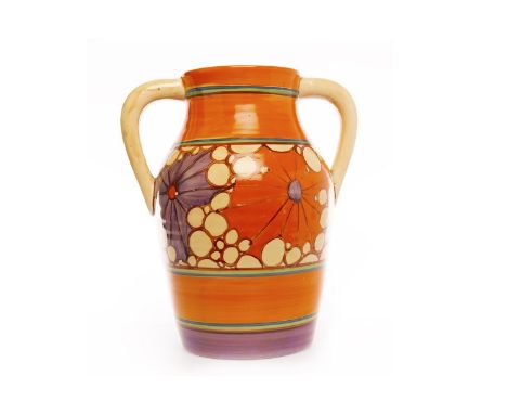 CLARICE CLIFF FOR WILKINSON FANTASQUE 'BROTH' PATTERN TWIN HANDLED JUG, of ribbed Lotus form, hand painted with flowers and b