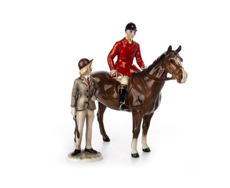 BESWICK FIGURE OF A HUNTSMAN, modelled on horseback, printed mark, 21cm high; along with a Goebel figure of a Huntswoman (2)