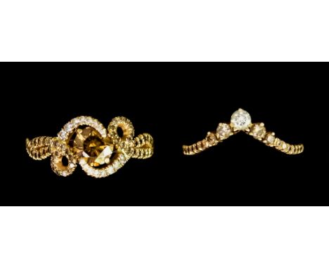 A Custom Made 18ct Gold Suite, comprising - engagement ring and wedding ring by The Wedding Ring Workshop, Hatton Garden, the