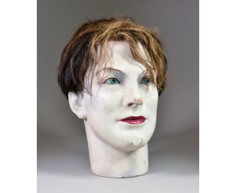 An Early 20th Century French Ceramic Male Mannequin Head, inscribed "P.Imans - Paris X10872 1551" to neck, 11.5ins high