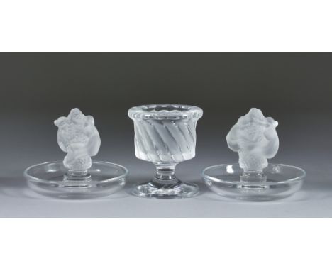 Three Pieces of Lalique Glass, two Irene ring dishes in clear and frosted glass of two ladies wrapped around a grouping of gr
