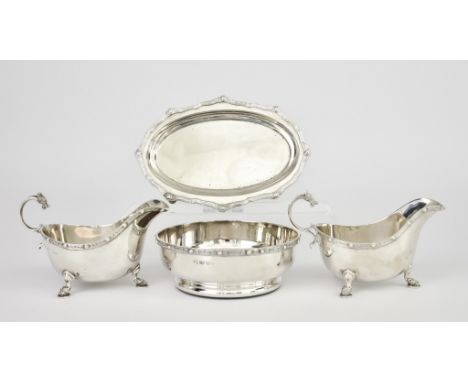A Pair of George VI Silver Oval Sauceboats and Oval Dish,&nbsp;by Adie Brothers Ltd, Birmingham 1946, cast with Celtic rims, 