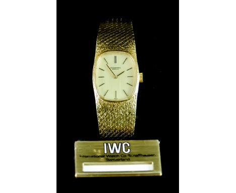 A Lady's Manual Wind Wristwatch, by IWC (International Watch Company), 24mm x 20mm oval dial, 18ct gold case with integral br