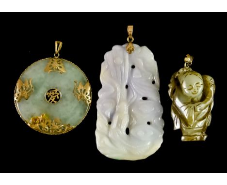 Three Jade Pendants, comprising - one carved musician suspended from 14ct gold wire and bale, 50mm x 35m, a large carved jade