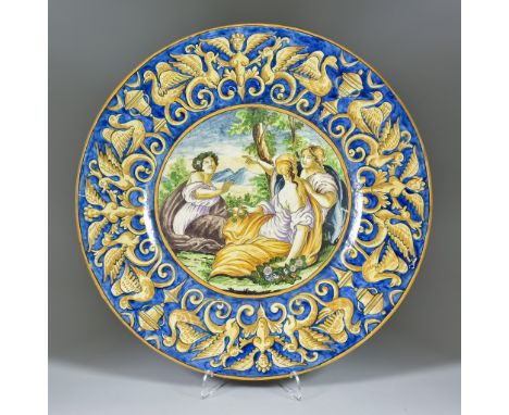 An Italian Maiolica Pottery Charger, Late 19th Century, the centre enamelled in colours with mythological scene, the rim with