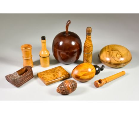 A Selection of Treen Items, comprising: - a pair of travelling candlesticks 4.25ins diameter, a box in the form of an apple 5