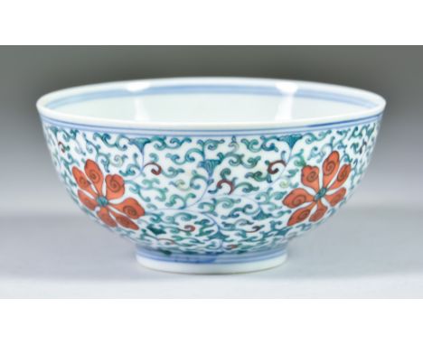 A Chinese Doucai &lsquo;Lotus Flower&rsquo; Porcelain Bowl,&nbsp;painted with five lotus flowers on a meandering scroll groun