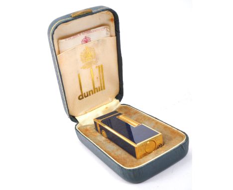 Dunhill -&nbsp;A vintage 20th century circa. 1980's 18ct Gold plated and Blue Marble Lacquer Dunhill Rollagas lighter. Marble