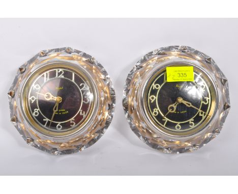 Majak - A pair of vintage retro mid 20th century circa. 1960's Russian USSR Majak mantel clocks. Each being set within facete