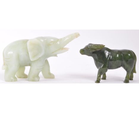 Two 20th century carved Chinese figures to include one nephrite jade exampled in the form of a buffalo and an elephant hardst