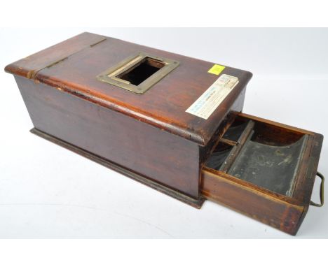 A 20th Century vintage mahogany cased cash register / till having a pull out lower shelf with sectional drawer below a flip t