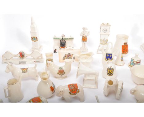 A large assortment of crest ware china ceramic miniatures. To include; Gemma, small miniature lidded pots, clock towers, pots