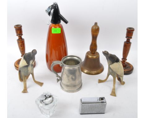 An assortment of mid 20th century vintage retro items to include a pair of carved buffalo horn bird figures, a BOC soda sypho