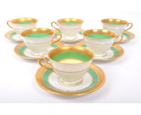A set of six early 20th century German Bavaria Rosenthal porcelain coffee cups &amp; saucers in the 'Empire' pattern. Each de