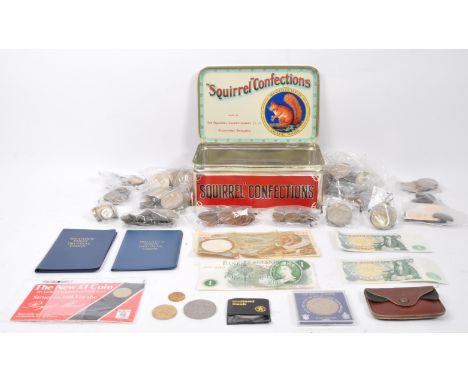 A large collection of early 20th Century and later UK and foreign uncirculated coins. To include; one pound notes, French fra