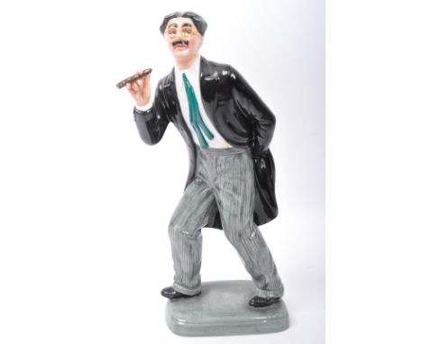 Royal Doulton - A limited edition Royal Doulton hand painted bone china Groucho Marx figurine. Modelled by William K. Harper.