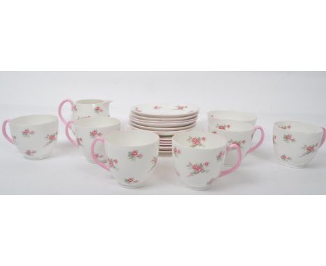 A retro vintage mid 20th century circa. 1950's Shelley bone china tea service. The service comprising of six teacups, saucers