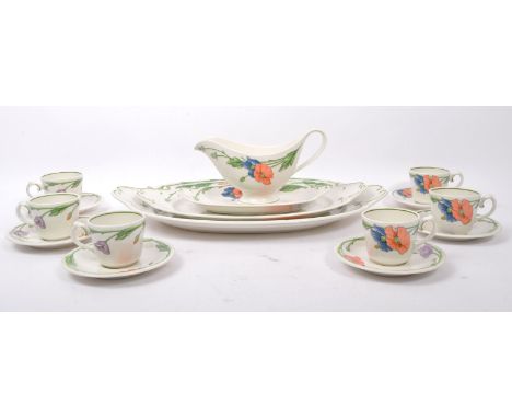 A vintage 20th century German Villeroy &amp; Boch 'Amapola' pattern bone china tea and dinner wares, to include coffee cups &