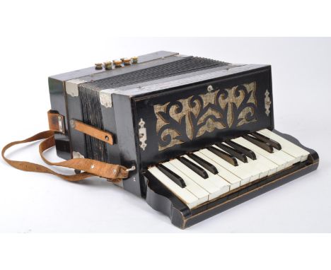 A vintage 20th century German&nbsp;Steldeni Italian Model 13 Key accordion. It measures approx. 33cm long.