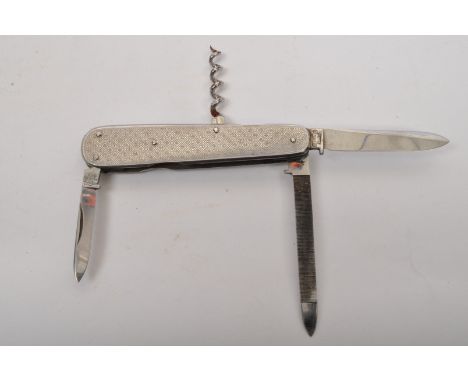 G. Ibberson &amp; Co - An early 20th century G. Ibberson of Sheffield multi tool pocket knife having engine turned quatrefoil