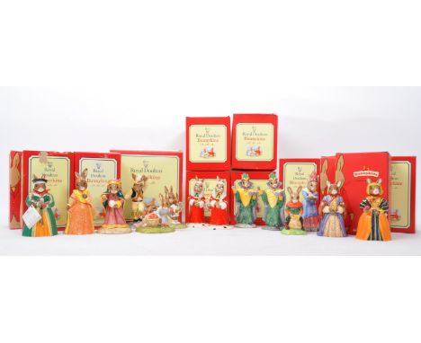 A collection of NOS (New Old Stock) Royal Doulton 'Bunnykins' bone china figurines. The lot to include Anne Boleyn, Catherine