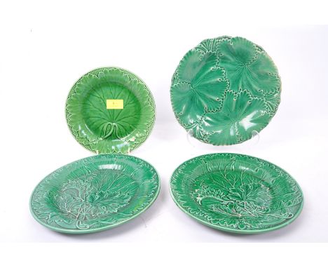 An assortment of four Victorian 19th century majolica ceramic leaf plates. The lot to include a Wedgwood leaf plate, two unma