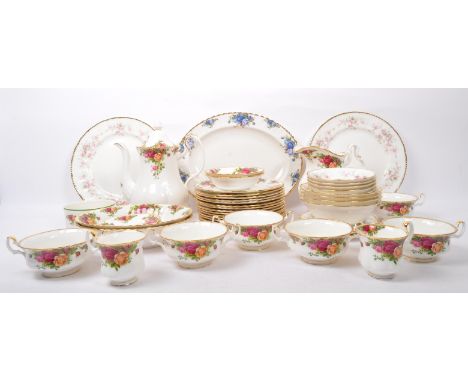 An assortment of NOS (New Old Stock) Royal Albert fine bone china tea &amp; coffee services items. The lot to include Royal A