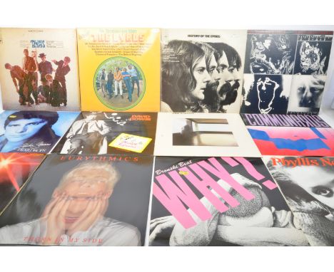 A collection of vintage 20th century LP vinyl records to include Dusty Springfield, Dire Straits, Whitney Houston, Cher, Dion