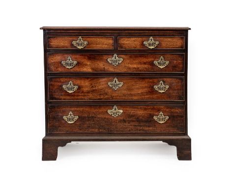 A George III Mahogany and Oak-Lined Straight Front Chest of Drawers, late 18th century, the moulded top above two short and t