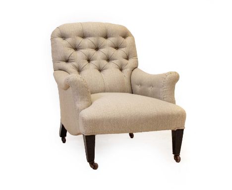 A Late 19th Century Deep-Seated Armchair, in the manner of Howard &amp; Sons, recovered in light-grey buttoned fabric, with r