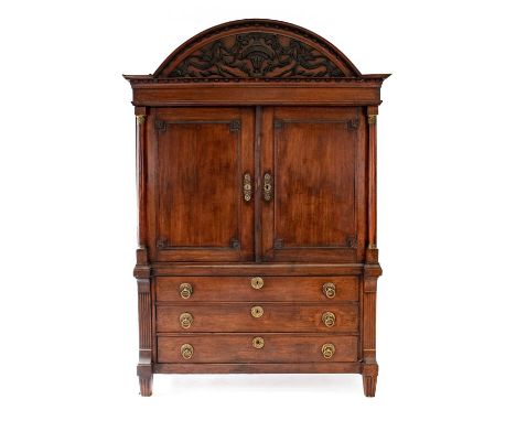 An Imposing 19th Century Dutch Mahogany and Pine-Lined Press, the moulded pediment above a panel decorated with ebonised leav