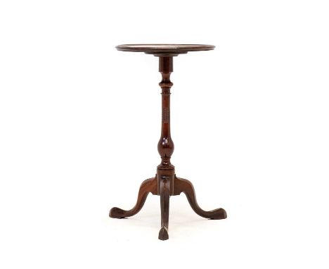 A George III Mahogany Dish-Top Tripod Table, circa 1800, the moulded top above a spiral and part-wrythen turned baluster supp