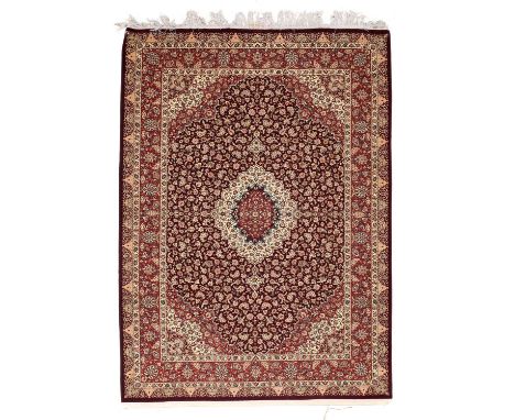 Very Fine Kork Kashan CarpetCentral Iran, modernWoven on a silk foundation, the aubergine ground profusely decorated with vin